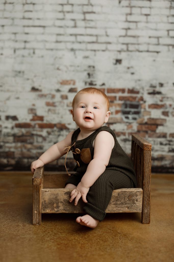 Urban styled milestone photoshoot of baby boy Colter in Cedar Falls studio.